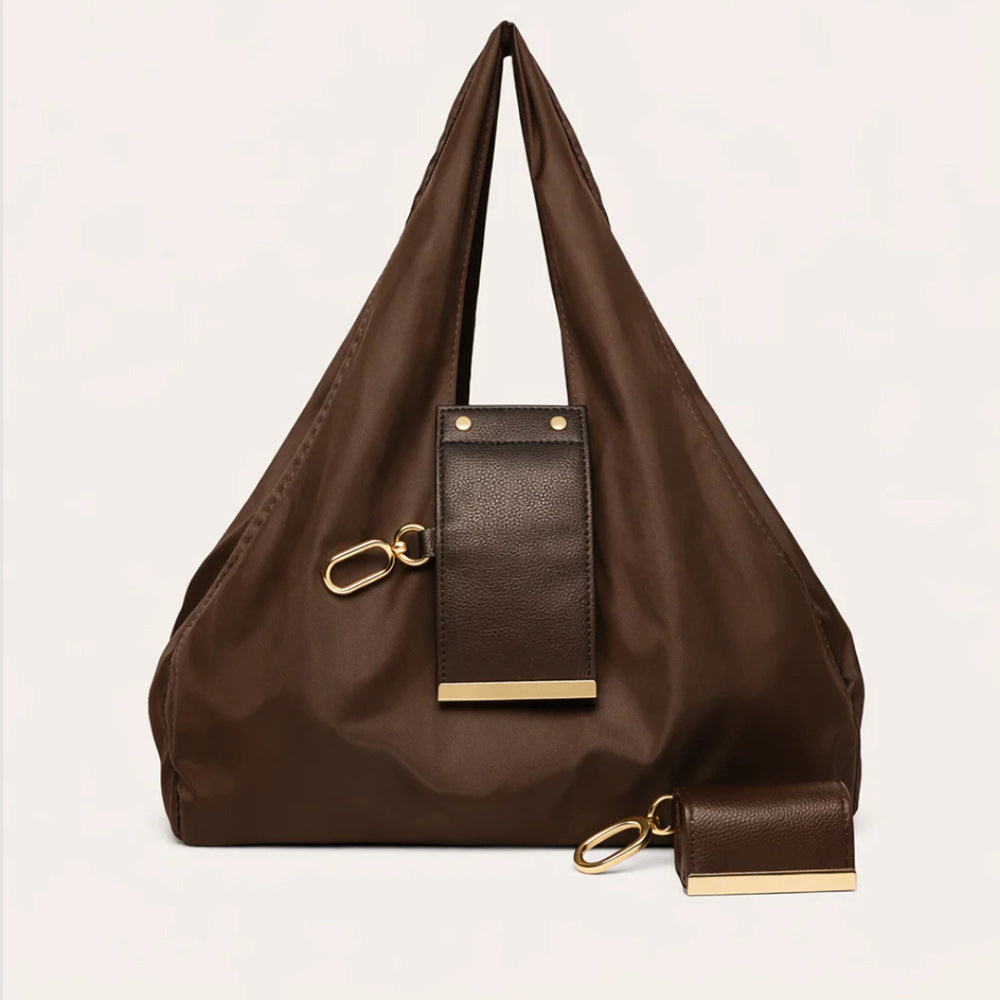 Looks Like a Keychain. Turns Into Your Everyday Tote.