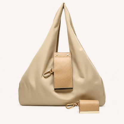 Looks Like a Keychain. Turns Into Your Everyday Tote.